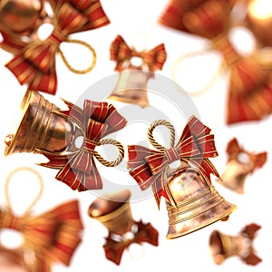 Golden bells with a red bow. isolated on white.