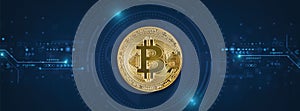 Golden bitcoin on blue tech circuits background