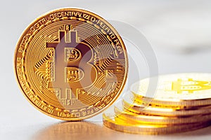 Golden bitcoin close up