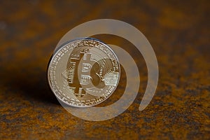 Golden bitcoin coin close-up