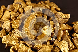 Golden Bitcoin Coin and mound of gold. Bitcoin cryptocurrency. Business concept