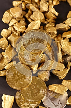 Golden Bitcoin Coin and mound of gold. Bitcoin cryptocurrency. Business concept