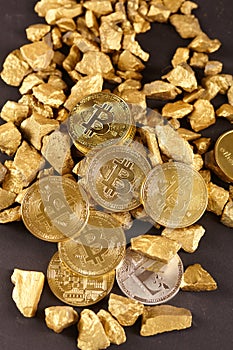 Golden Bitcoin Coin and mound of gold. Bitcoin cryptocurrency. Business concept