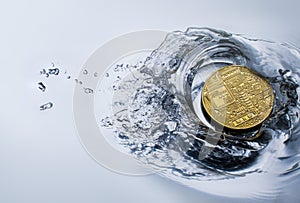 golden bitcoin coin with water splash crypto currency background