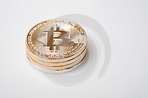 Golden bitcoin cryptocurrency on white background