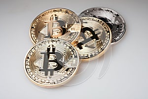 Golden bitcoin cryptocurrency on white background