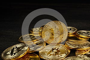 Golden Bitcoin on dark backround. New virtual money. Crypto currency