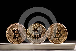 Golden Bitcoin digital currency, financial industry, Black background