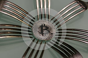 Golden bitcoin and silver forks around