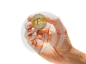 Golden bitcoin in a man hand, white background. Holding wealth concept. Investing money into virtual currency for profit theme.