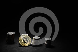 Golden bitcoin with money coins background. Bitcoin on black background photo