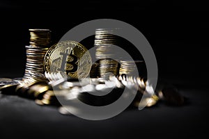 Golden bitcoin with money coins background. conceptual image for crypto currency. photo