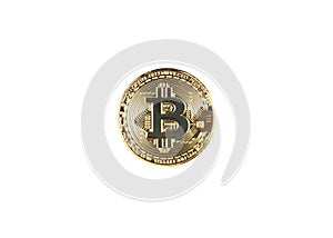 Golden bitcoin oisolated on white background.