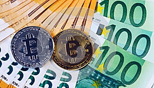 Golden bitcoin over Euro money. Bitcoin cryptocurrency. Crypto currency concept. Bitcoin with euro bills. Bitcoins stacked on euro