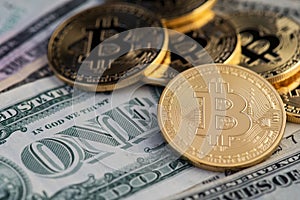 Golden Bitcoins and banknotes of one dollar. Bitcoins on US dollars