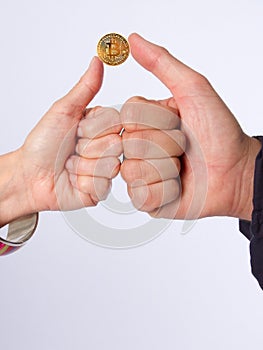 Golden bitcoins in hand. Digital symbol