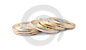 Golden bitcoins on white background