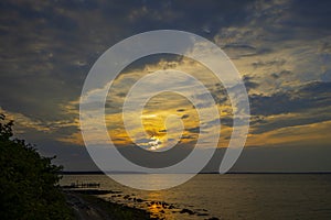 Golden blue light sunset sunrise ocean shoreline cloudscape