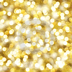 Golden bokeh effect background for Christmas and new year greetings or wishes, soft luxury gold background