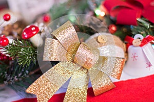 Golden Bow with Christmas decoration