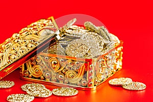 A Golden Box Filled with Golden Coins