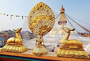 Golden brahma symbol in front of Bodhnath stupa