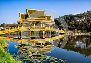 Golden Bridge and Pavilion of the Enlightened. Ancient City Park, Thailand photo