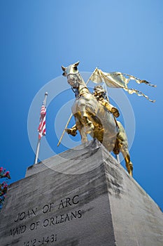 Golden bronze statue Joan of Arc photo