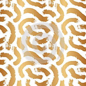 Golden brush blots strokes. Seamless pattern. Pretty gold stripes. Background with brushstroke bold smudge. Abstract grungy swirl.