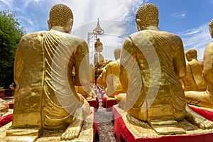 Golden Buddha with 1250 disciples statue at Makha Bucha Buddhist memorial park is built on the occasion of Great period