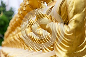 Golden Buddha with 1250 disciples statue at Makha Bucha Buddhist memorial park is built on the occasion of Great period, Nakhon