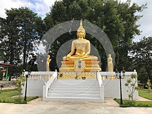 Golden buddha in Amphoe Sai Yok