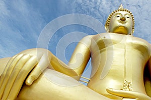 Golden Buddha with blue sky