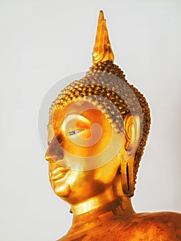 Golden Buddha bust statue at Wat Pho, Bangkok, Thailand