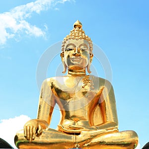 The golden Buddha with clear blue sky