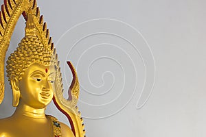 Golden Buddha face, soft background