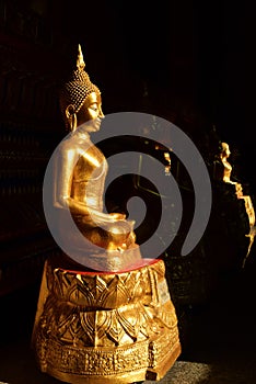 The golden Buddha image.