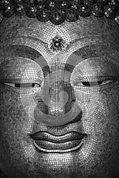 Golden Buddha image face style , hilight and shadow of buddha golden face