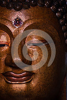 Golden Buddha image face style , hilight and shadow of buddha golden face