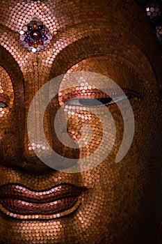 Golden Buddha image face style , hilight and shadow of buddha golden face