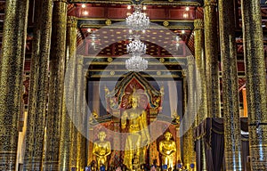 The golden buddha image inside the Buddhist church at the famous Wat Chedi Luang Varavihara