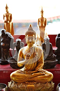 Golden Buddha image in sitting posture