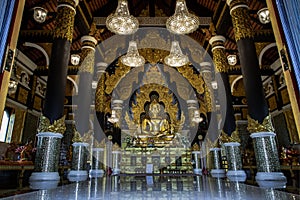 The golden buddha image within Wat Phra That Doi Phra Chan in Lampang