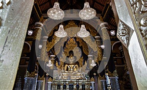 The golden buddha image within Wat Phra That Doi Phra Chan in Lampang