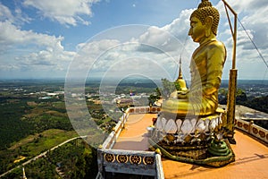 Golden Buddha monument in Krabi. Tiger temple