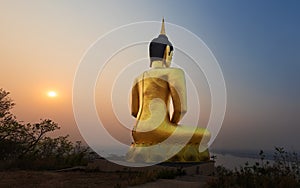 Golden Buddha overlooking Pakse at Wat Phousalao. Laos photo