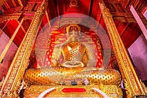 Golden Buddha in in Phrathat Chom Sin temple