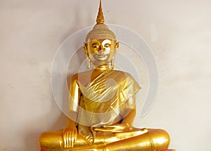 Golden Buddha satue in a buddhist temple