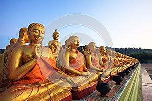 Golden buddha statue in buddhism temple thailand against fade b