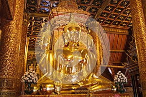 The golden Buddha statue in church of Wat Phumin